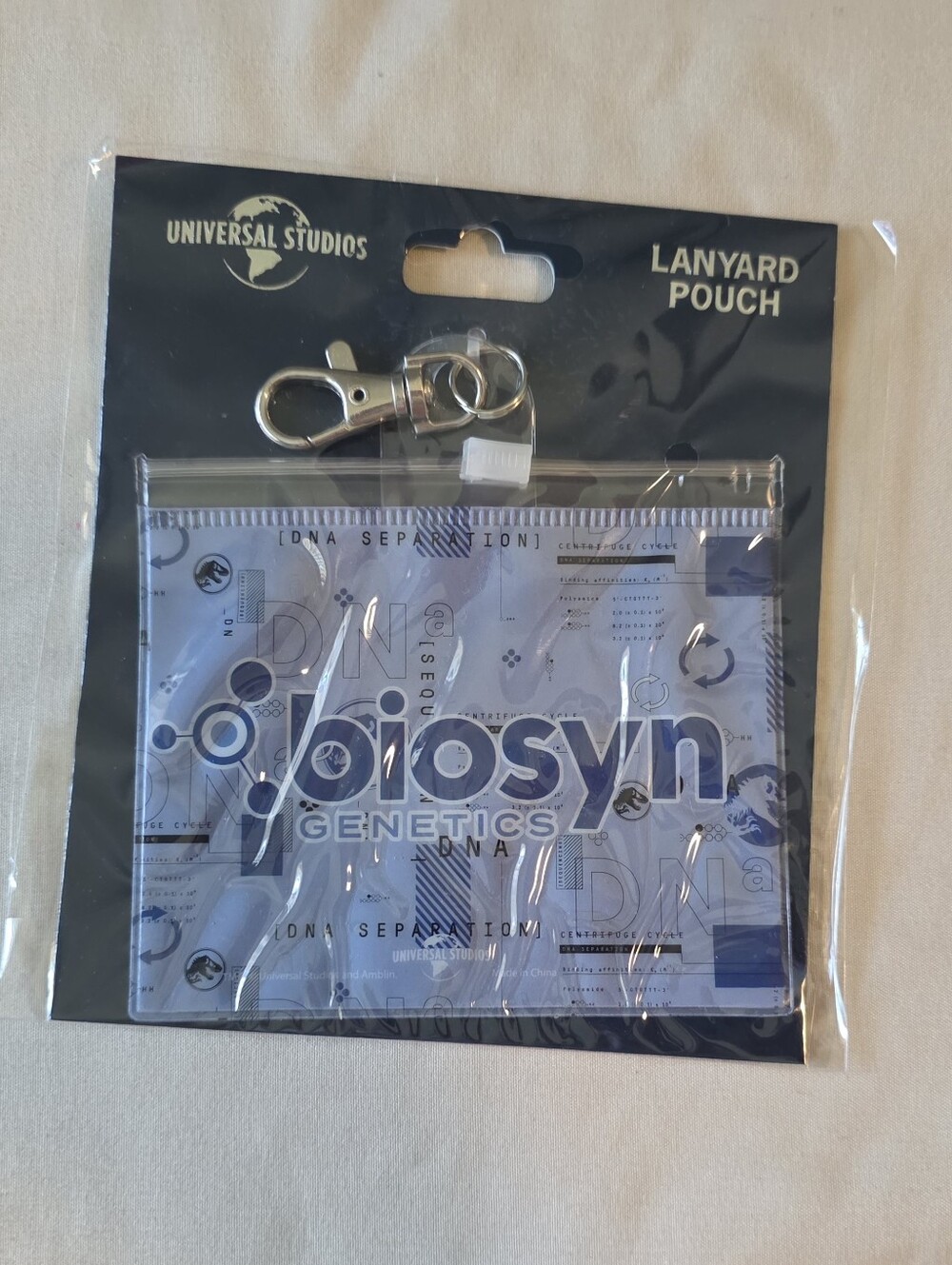 Universal Blue Biosyn Genetics Lanyard Pouch with Clip